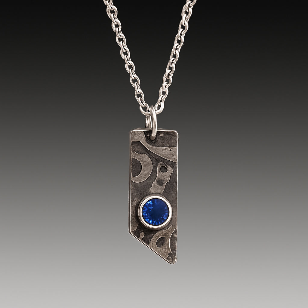 Midnight Crest Blue Topaz Pendant