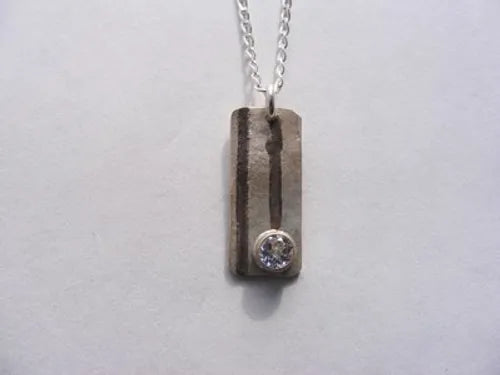 Clear Topaz Etched Pendant